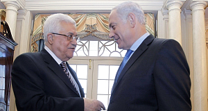 Israeli Prime Minister Benjamin Netanyahu talks with Palestinian President Mahmoud Abbas today.