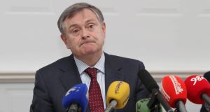 Minister for Public Expenditure and Reform Brendan Howlin details the Governments sale of state assets during a press conference today.