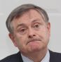 Minister for Public Expenditure and Reform Brendan Howlin details the Governments sale of state assets during a press conference today.