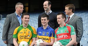 Patrick McBrearty, Donegal, left, Michael Quinlivan, Tipperary, centre, and Cillian OConnor, Mayo, with Cadbury Hero of the Future Judges, back row, Paul Caffrey, left, Dermot Earley, centre, and Micheál Ó Domhnaill. Pic: Sportsfile