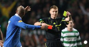 Rangers El-Hadji Diouf is sent off after the final whistle by referee Callum Murray Rangers El-Hadji Diouf is sent off after the final whistle by referee Callum Murray