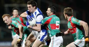 Laois Colm Begley under pressure from Richie Feeney and Peadar Gardiner of Mayo in todays match. Picture: Inpho Laois Colm Begley under pressure from Richie Feeney and Peadar Gardiner of Mayo in todays match. Picture: Inpho