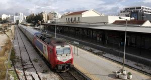 A train lies idle beside an empty platform in Greece. Pic: AP