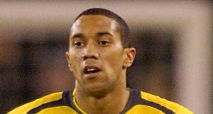 Arsenal defender Gael Clichy has been ruled out for up to a month with a suspected stress fracture in his back.