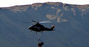 An Army helicopter takes wreckage from the Air Corps plane that went down into a valley near Lough Mask in Co Galway in 2009. Picture: Ray Ryan An Army helicopter takes wreckage from the Air Corps plane that went down into a valley near Lough Mask in Co Galway in 2009. Picture: Ray Ryan