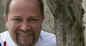French cook Gilles Goujon, poses in the garden of his restaurant, LAuberge du Vieux Puits in the village of Fontjoncouse, south of France.
