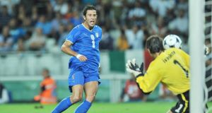 Fabio Grosso beats Dimitar Ivankov to score his sides first goal. Fabio Grosso beats Dimitar Ivankov to score his sides first goal.