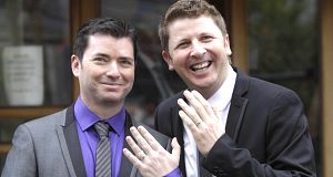 Hugh Walsh (left) and partner Barry Dignam, celebrate having one of the first civil partnerships in Ireland, after tying the knot at the Registry Office, Sir Patrick Dunnes Hospital, Grand Canal Street, Dublin today.