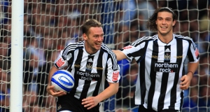 Kevin Nolan (left) selebrates scoring his third goal against Ipswich.