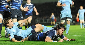 Tries from Shane Horgan and Stephen Keogh drove Leinster to a 17-point win over the Cardiff Blues at the RDS, moving the European champions back to the top of the Magners League in the process.