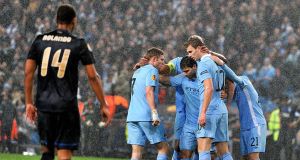 Edin Dzeko (second right) celebrates with team-mates after scoring his teams second goal Edin Dzeko (second right) celebrates with team-mates after scoring his teams second goal
