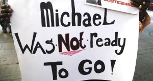 Michael Jackson fan Bristre Clayton of Las Vegas stands outside court during the trial of Conrad Murray. Michael Jackson fan Bristre Clayton of Las Vegas stands outside court during the trial of Conrad Murray.