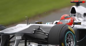 Mercedes Formula One driver Michael Schumacher of Germany controls his car on turn 15 during the qualifying session of Australian Formula One Grand Prix in Melbourne. Mercedes Formula One driver Michael Schumacher of Germany controls his car on turn 15 during the qualifying session of Australian Formula One Grand Prix in Melbourne.