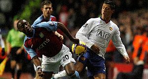 Aston Villas Nigel Reo-Coker, left, vies for the ball with Manchester Uniteds Cristiano Ronaldo. Pic: PA Aston Villas Nigel Reo-Coker, left, vies for the ball with Manchester Uniteds Cristiano Ronaldo. Pic: PA