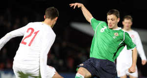 Northern Irelands Chris Baird tangles with Serbias Radoslav Petrovic during the International Friendly at Windsor Park, Belfast. Northern Irelands Chris Baird tangles with Serbias Radoslav Petrovic during the International Friendly at Windsor Park, Belfast.
