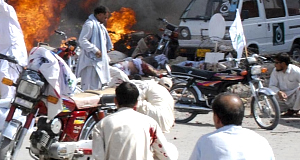 Injured people lie down on road after the explosion during a Shiite procession in Quetta, Pakistan. Injured people lie down on road after the explosion during a Shiite procession in Quetta, Pakistan.