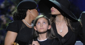 Paris Jackson, centre, pictured with Janet and La Toya Jackson during the memorial service for her late father on Tuesday.