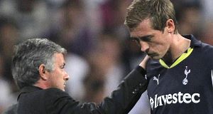 Tottenham Hotspurs Peter Crouch is comforted by Real Madrid coach Jose Mourinho after being sent off by referee Felix Brych last night. Tottenham Hotspurs Peter Crouch is comforted by Real Madrid coach Jose Mourinho after being sent off by referee Felix Brych last night.