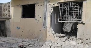 In this citizen journalism image provided by the Local Coordination Committees in Syria, a damaged house from the Syrian government forces shelling at Baba Amr neighborhood in Homs province, Syria, today.