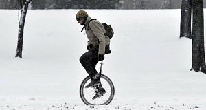 Snow has hit many parts of Europe…In this picture, a man rides a unicycle through the snow-covered City Park of central Budapest, Hungary.