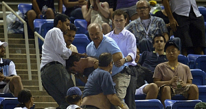 A fight between tennis fans breaks out in the stands and interrupts play between Serbias Novak Djokovic and Germanys Philipp Petzschner during day four of the US Open, at Flushing Meadows, New York, USA. Pic: PA